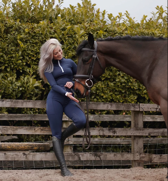 Model wearing Cameo Core Collection Baselayer in Navy