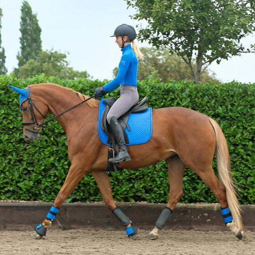 Rider wearing Hy Sport Active Base Layer in Jewel Blue