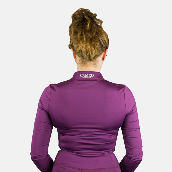 Rear view of model wearing Cameo Core Collection Baselayer in aubergine