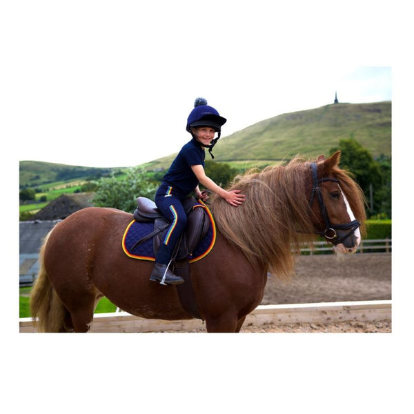 Rider wearing Rainbow Riders Polo Shirt