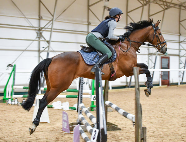 Sponsored rider Ellie wearing Cameo Core Collection Baselayer in Marl under a body protector.