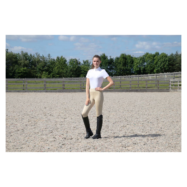 Model wearing Hy Equestrian DynaMizs Scarlet Show Shirt in White